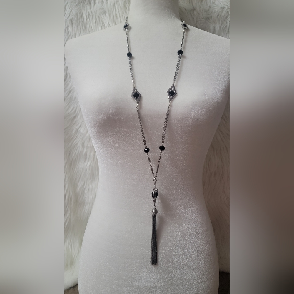 Long silver necklace with black  beads. From White House Black Market.